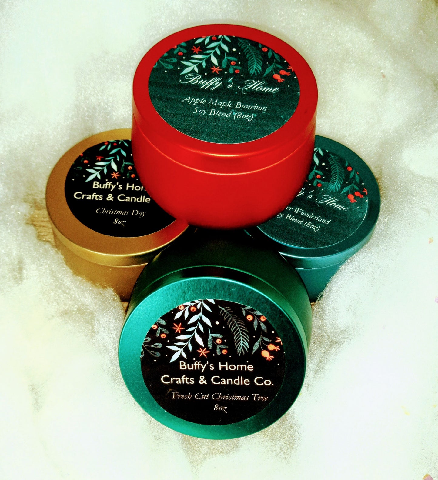 Get 3 Holiday Fragrance Candles for $25.00 (8oz multi-colored tins)