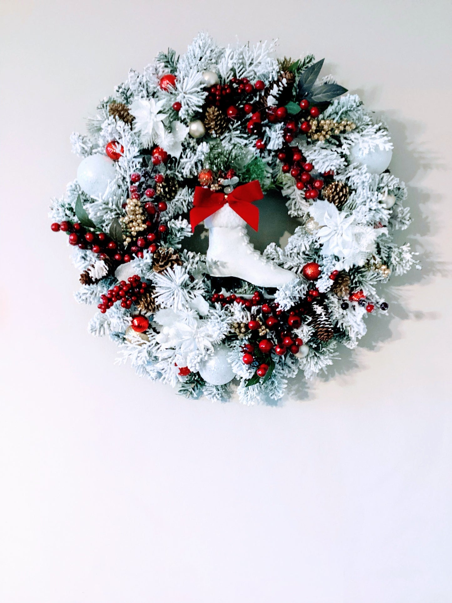 Evergreen ice-skate wreath