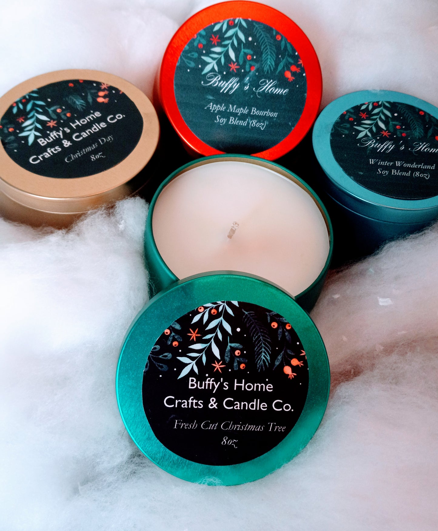 Get 3 Holiday Fragrance Candles for $25.00 (8oz multi-colored tins)