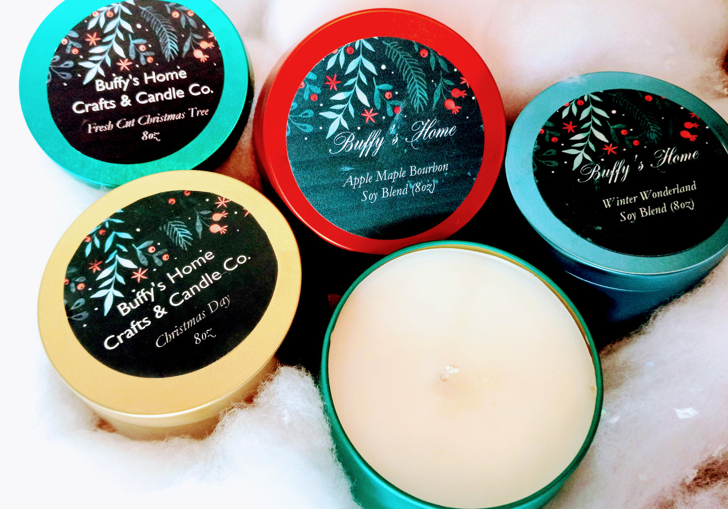 Get 3 Holiday Fragrance Candles for $25.00 (8oz multi-colored tins)